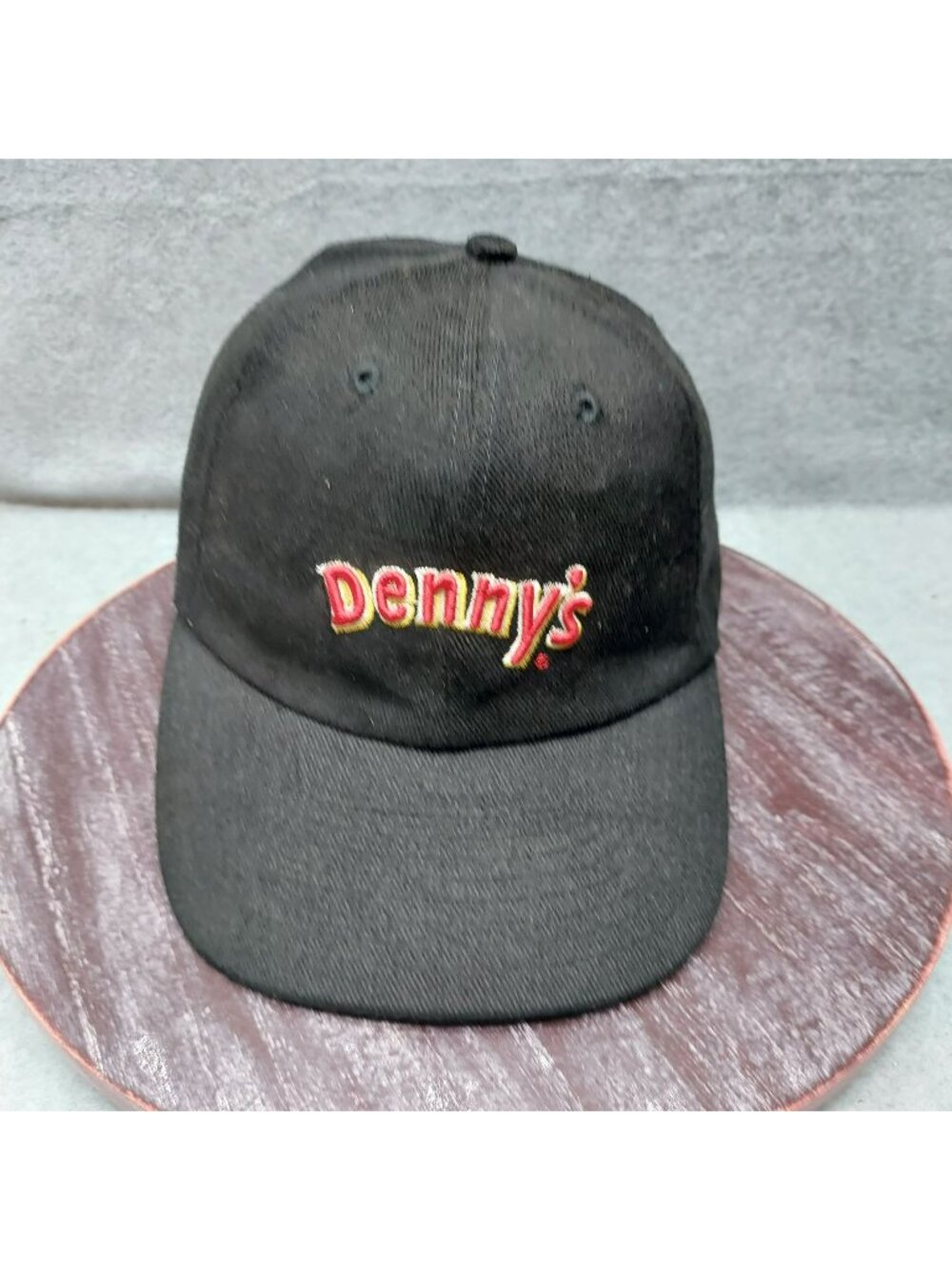 Dennys Black Adjustable Baseball Cap With Embroidered Logo And Metal Clasp
